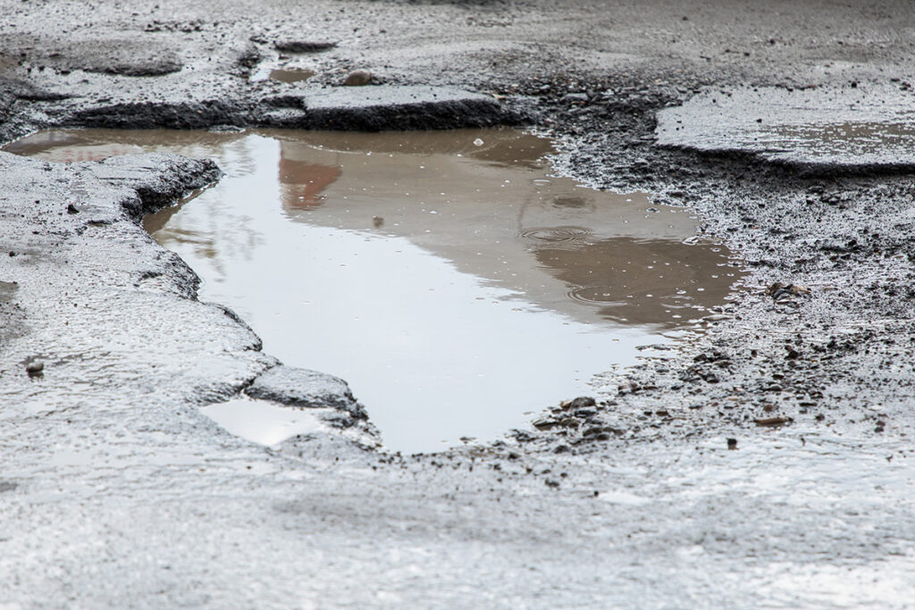 baughman magic seal, cold patch asphalt, damaged asphalt, asphalt repair, potholes
