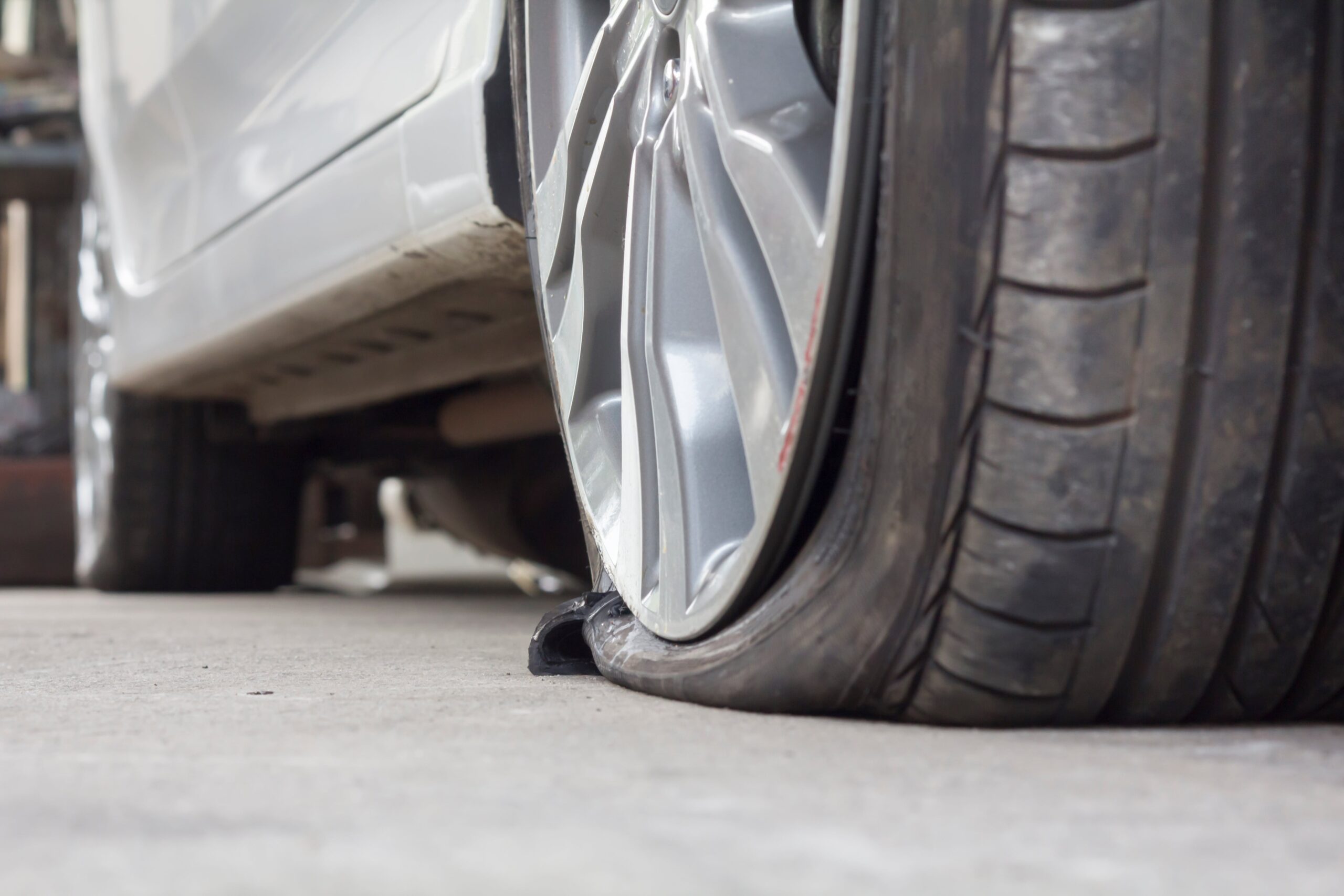 Read more about the article The Hidden Dangers of Damaged Asphalt on Your Car
